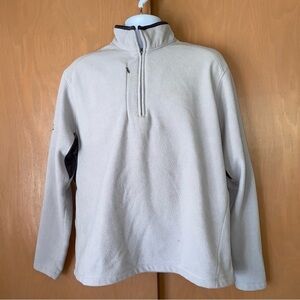 PING fleece half zipper fleece offers a deep breast pocket and wicking vents.
